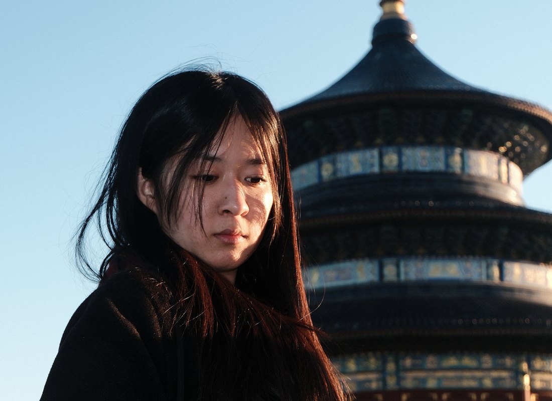 Xijia Feng in front of the Hall of Prayer for Good Harvests, Temple of Heaven, Beijing.